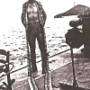 PT100RON14CREWMANWITH50CALROUNDSTOBOGAPANAMA1943.png